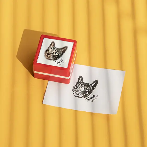 A stamp showing the likeness of a cat called Toast